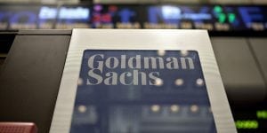 A Goldman Sachs Group Inc. logo hangs on the floor of the New York Stock Exchange in New York, U.S., on Wednesday, May 19, 2010. Goldman Sachs Group Inc. racked up trading profits for itself every day last quarter. Clients who followed the firm's investment advice fared far worse. Photographer: Daniel Acker/Bloomberg via Getty Images